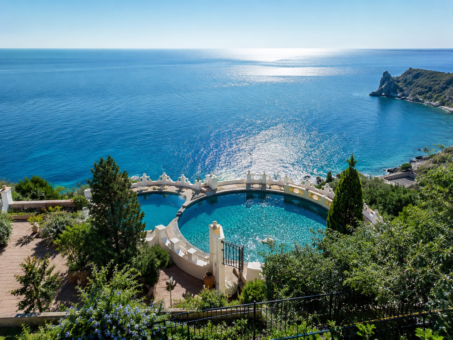 The twin seawater infinity pools above the sea